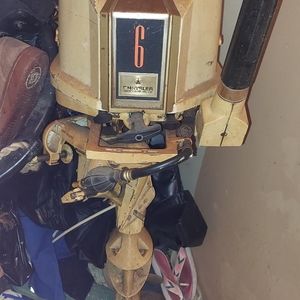 1970s old boat motor chrysler yellow